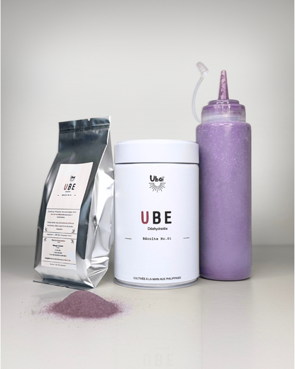Le full set d'ube Ubaï : La boîte en aluminium, sa recharge, le sirop Ubaï Halaya avec un tas de poudre d'ube